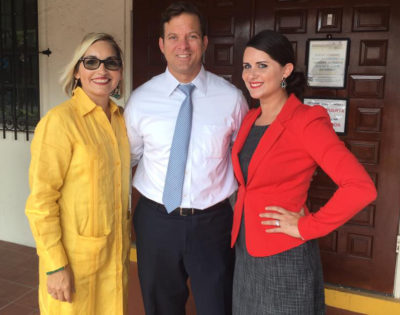 Lourdes Aguirre, el vicegobernador López-Cantera y Nilsa Alvarez.