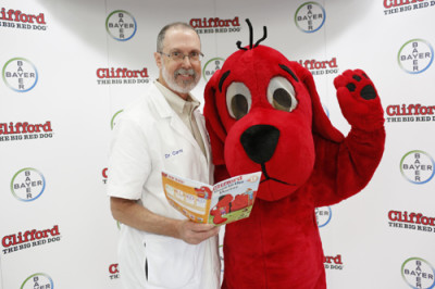 To commemorate Bayer Animal Healths limited-edition distribution of Clifford Goes to the Doctor, by Norman Bridwell and published by Scholastic, first grade students at Coral Park Elementary School enjoy a reading with Bayer Animal Health Veterinarian Dr. Dan Carey and Clifford the Big Red Dog on Thursday, May 12, 2016 in Miami, Fla. The story teaches children how to properly care for their pets and includes tips for parents on pet parasite prevention, and its release corresponds with Bayer Animal Healths International Companion Vector-Borne Disease (CVBD) Symposium, held in Miami from May 9-12, 2016. (Brian Blanco/AP Images for Bayer Animal Health)