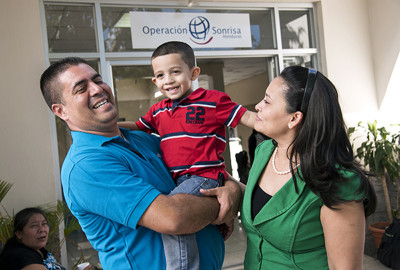 HND_2016_Tegucigalpa_Patient Advocate Alex Guerrero_004 Patient Advocate Alex Guerrero with his wife and son at the Operation Smile Cleft Lip and Cleft Palate Integral Care Clinic in Tegucigalpa, Honduras February 19, 2016. Don Alex was so happy with the care his son received from Operation Smile that he started looking for other people with cleft lips or palates, giving them support and information and helping them get to Operation Smile missions. He inspired the newly created patient advocate program. (Operation Smile Photo - Rohanna Mertens)
